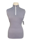 Patterned sleeveless top on a mannequin with a white background