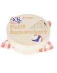 Round cheese shaped packaging with 'Petit Camembert' text.