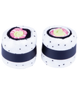 Cali Roll Socks outside of packaging in the shape of actual sushi rolls.
