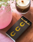 Stable Style Oversized Horseshoe Matches in Black/Gold Foil