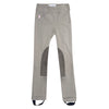 Tan riding pants with knee patches on a white background