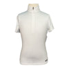 White short-sleeve shirt on a mannequin against a white background