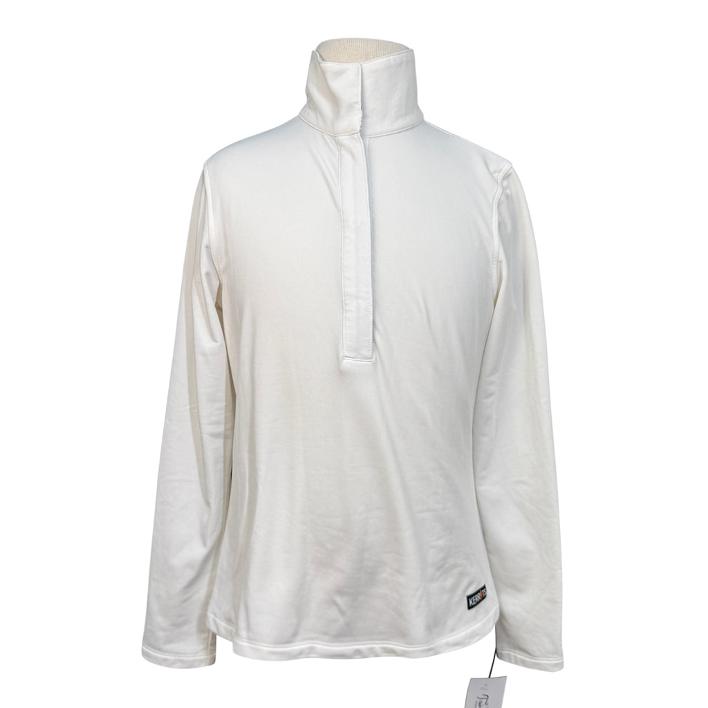 White collared long sleeve shirt on mannequin with white background.