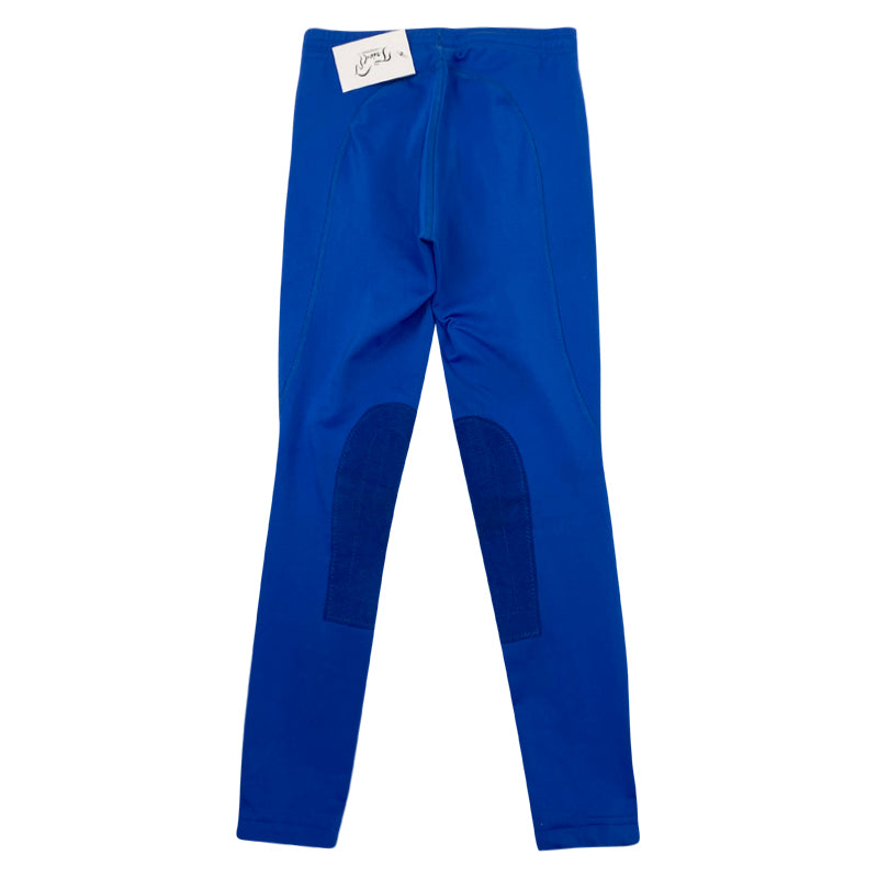Back of Kerrits Knee Patch Performance Tights in Electric Blue