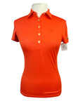 Front of Ariat TEK Heat Series Perforated Polo Shirt in Orange - Women's Small