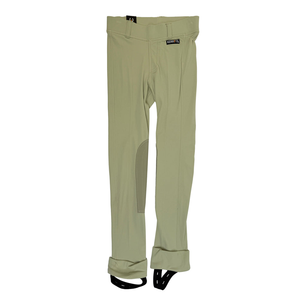 Tan riding pants on white background. 