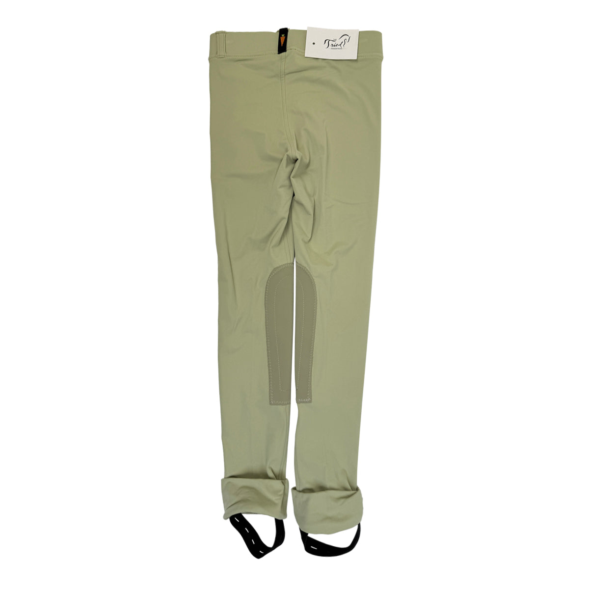 Tan riding pants on white background.