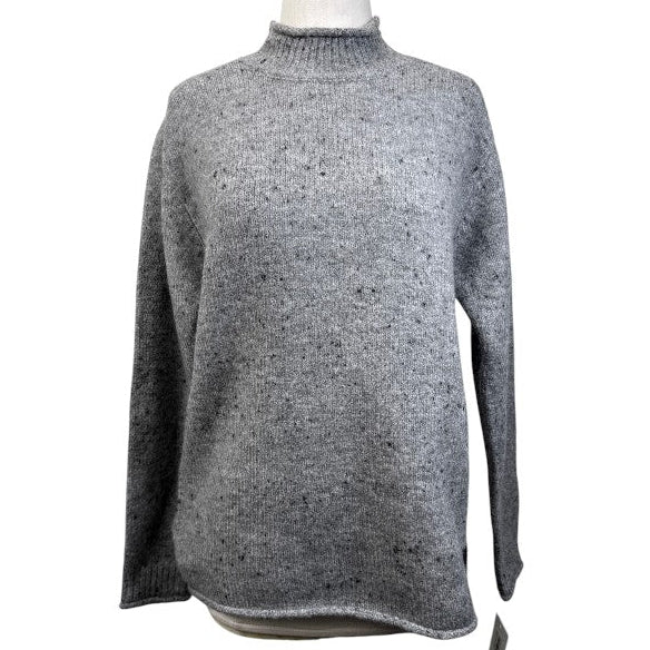 Gray sweater on a mannequin against a white background