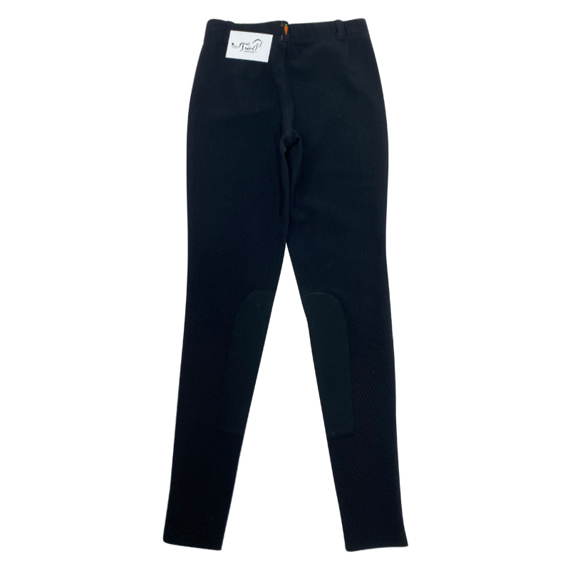 Back of Kerrits Microcord Knee Patch Tights in Black