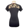 Black short-sleeve top with lace detailing on a mannequin against a white background