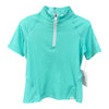 Turquoise short-sleeve shirt with a quarter zip on a white background