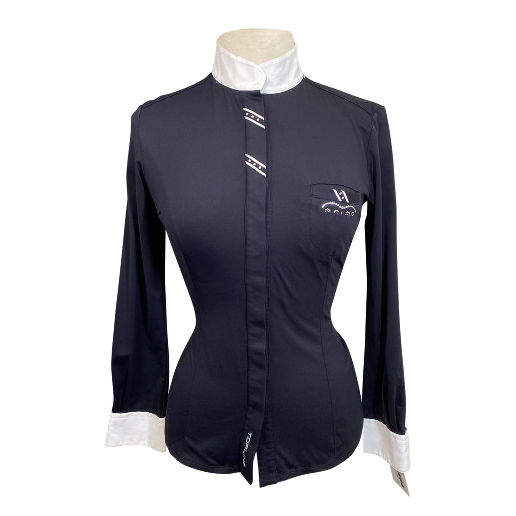 Black shirt with white collar and cuffs on a mannequin against a white background
