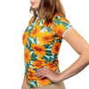 Woman wearing a sunflower patterned shirt on a white background