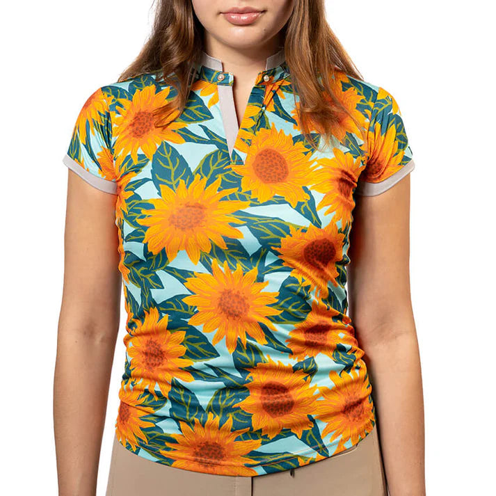 Sport polo shirt worn by a woman on a white background. 