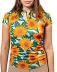 Sport polo shirt worn by a woman on a white background. 