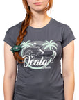 Person wearing a gray t-shirt with 'Ocala' graphic design