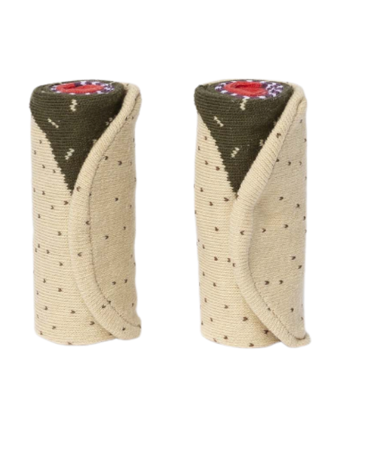 Two rolled-up socks with patterned ends on a white background