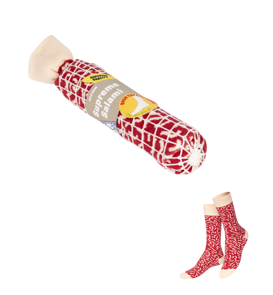 Red salami-shaped socks with a label on a white background