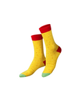 Pair of yellow socks with red tops and green toes on a white background