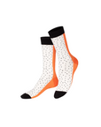 Pair of socks with white pattern and orange accents on a white background