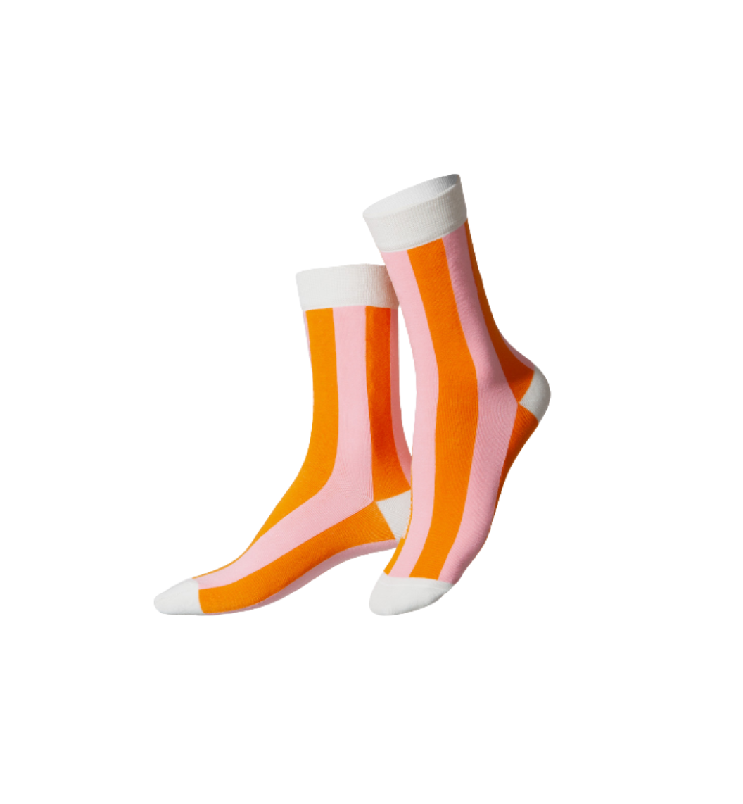 Pair of socks with pink and orange vertical stripes on a white background