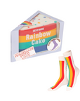 Rainbow cake-themed packaging with rainbow striped socks on a white background
