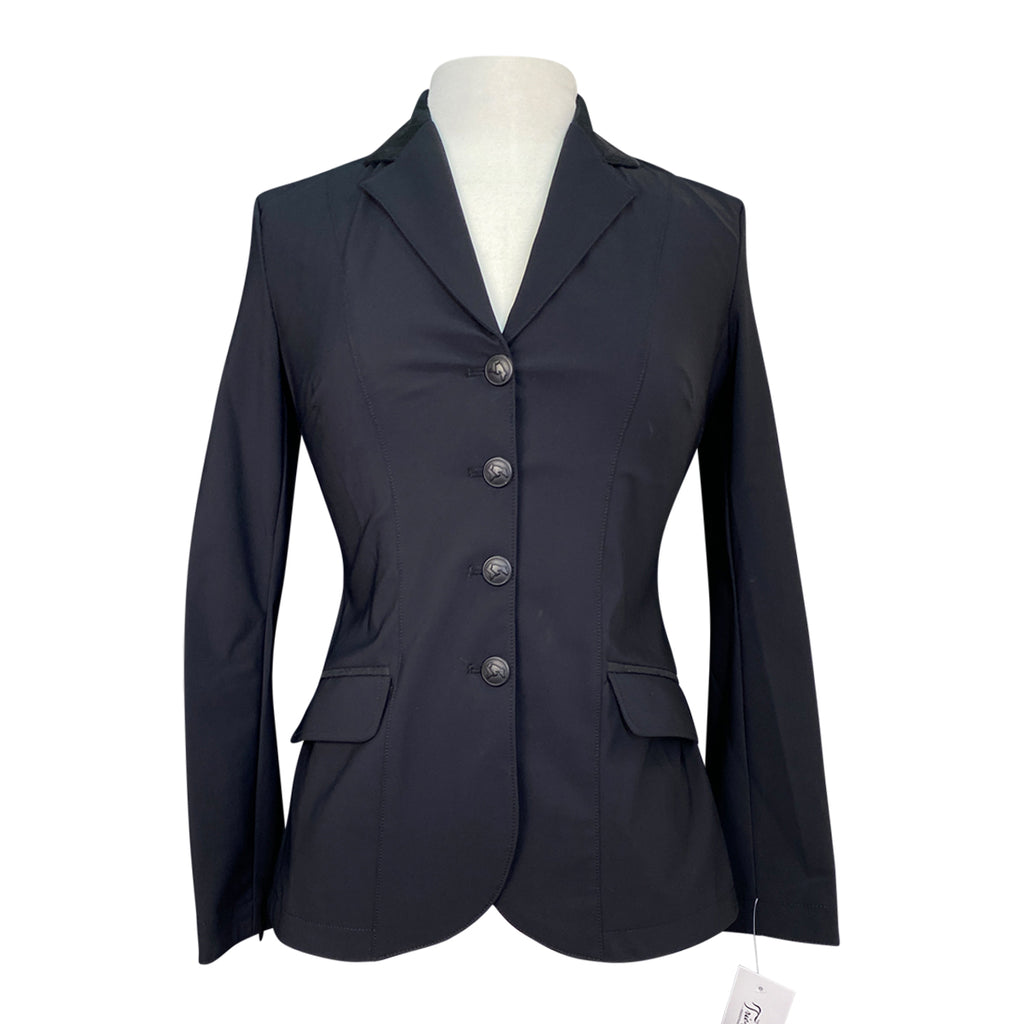 Black blazer on a mannequin with a white background
