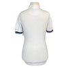 Back of Animo Short Sleeve Competition Polo in White/Blue Trim